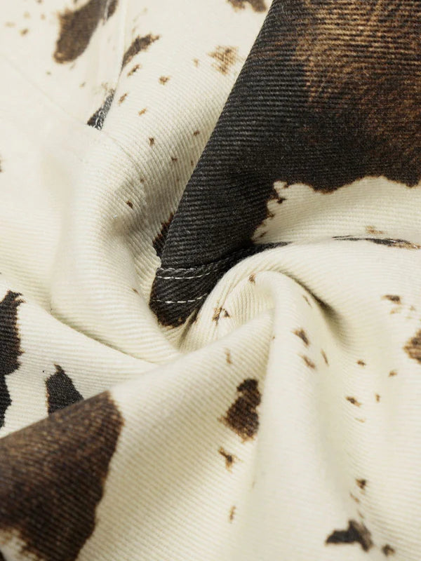 AELFRIC EDEN: COW PATTERN JEANS