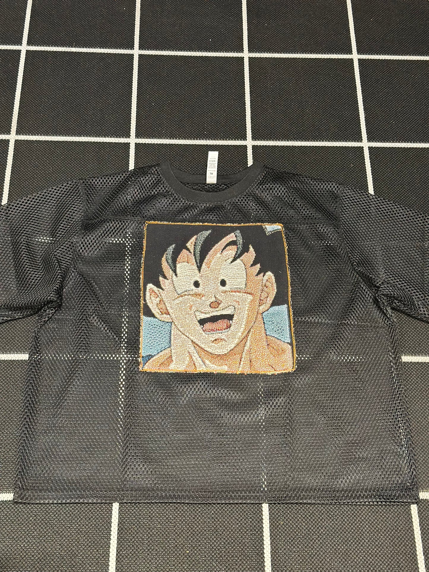 ANGEL GENTLE: JERSEY MESH TAPESTRY TOP- BLACK