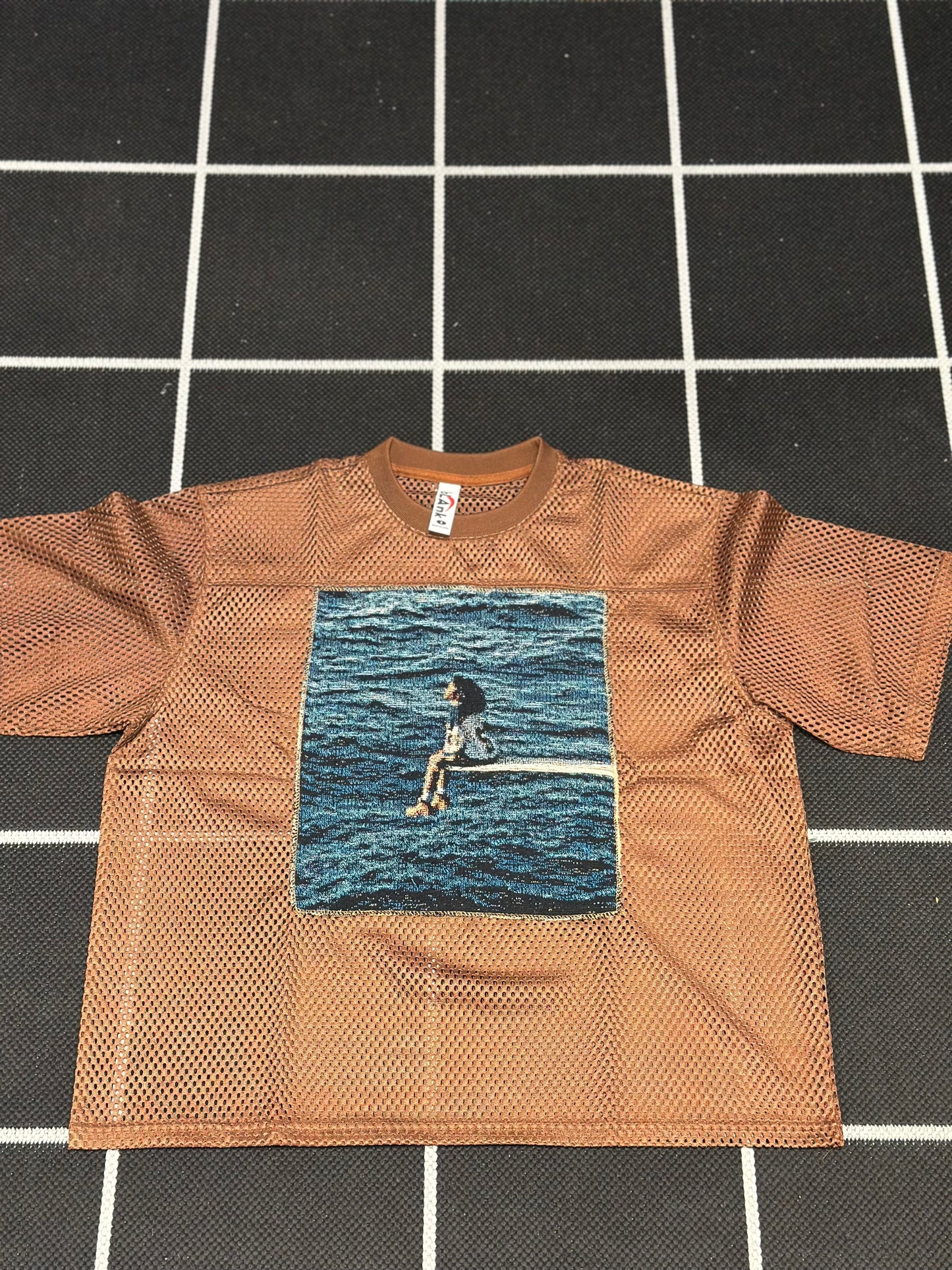 ANGEL GENTLE: SZA JERSEY MESH TAPESTRY TOP