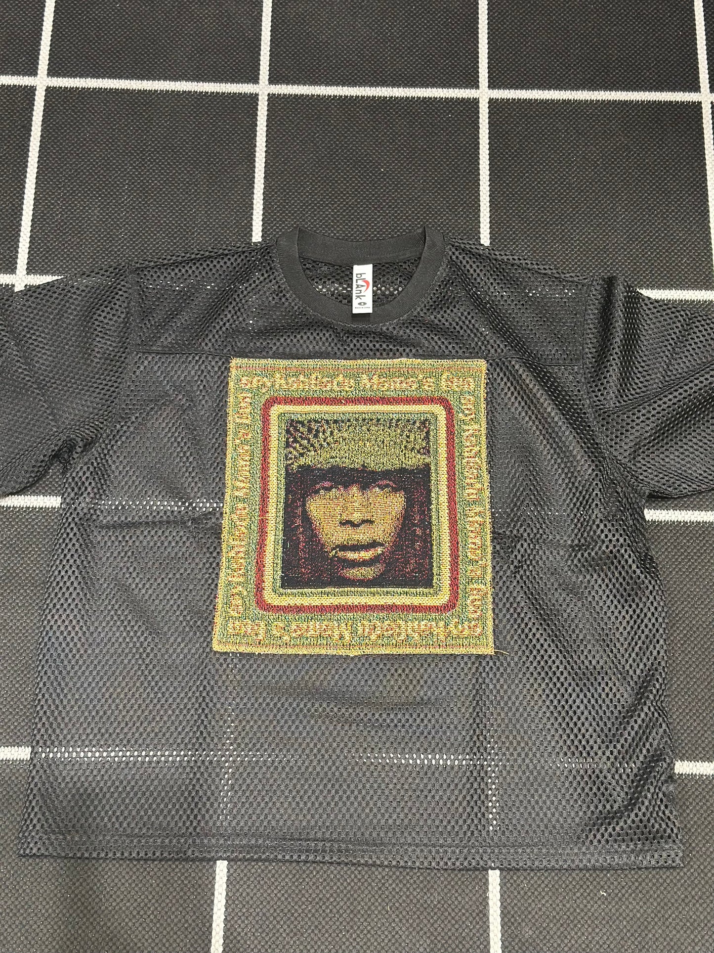 ANGEL GENTLE: E. BADU TAPESTRY JERSEY TOP