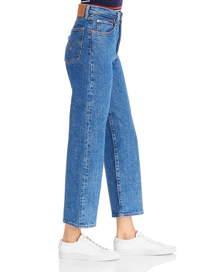 LEVIS WOMENS HIGH WAISTED DENIM RIBCAGE GEORGIE - 8586 (side view on model)