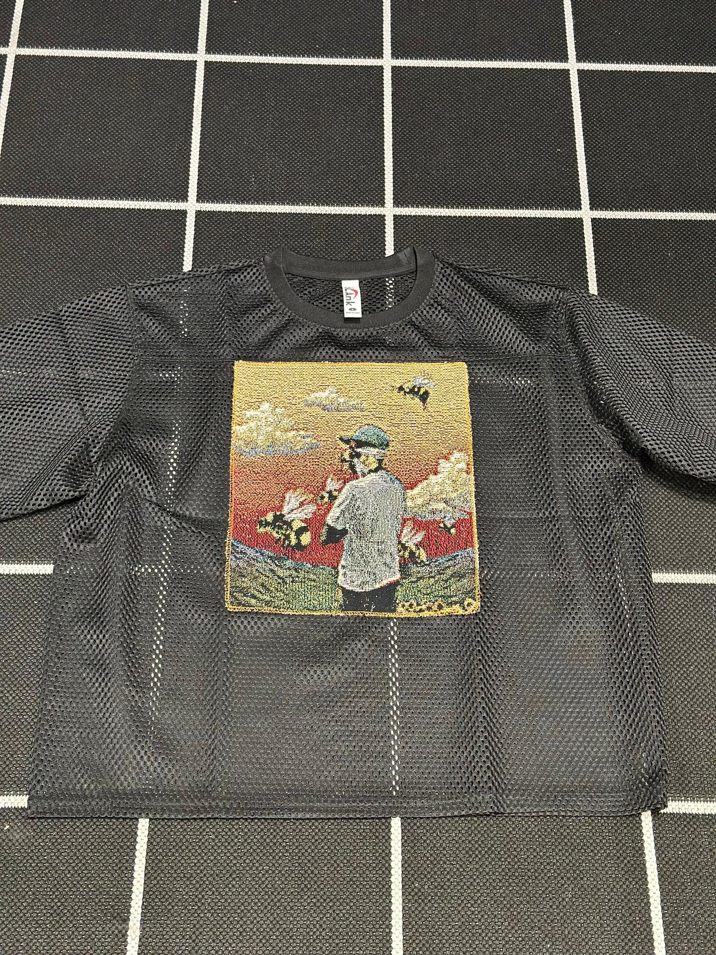 ANGEL GENTLE: JERSEY MESH TAPESTRY TOP- BLACK