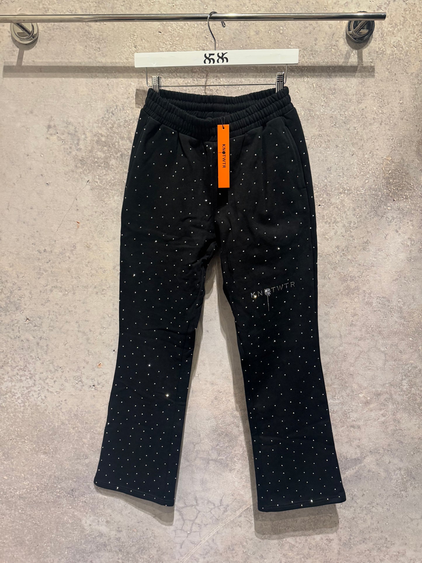 KNOTWTR RHINESTONE FLARED SWEATPANTS:
