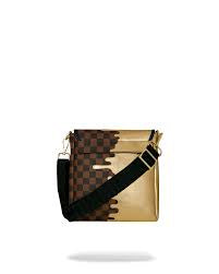 SPRAYGROUND: GOLD DRIP MESSENGER SLING
