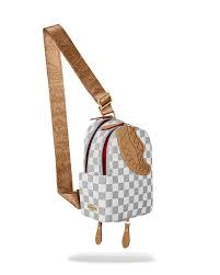 SPRAYGROUND: EMBOSSED CREAM BACKPACK SLING