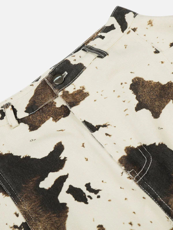 AELFRIC EDEN: COW PATTERN JEANS