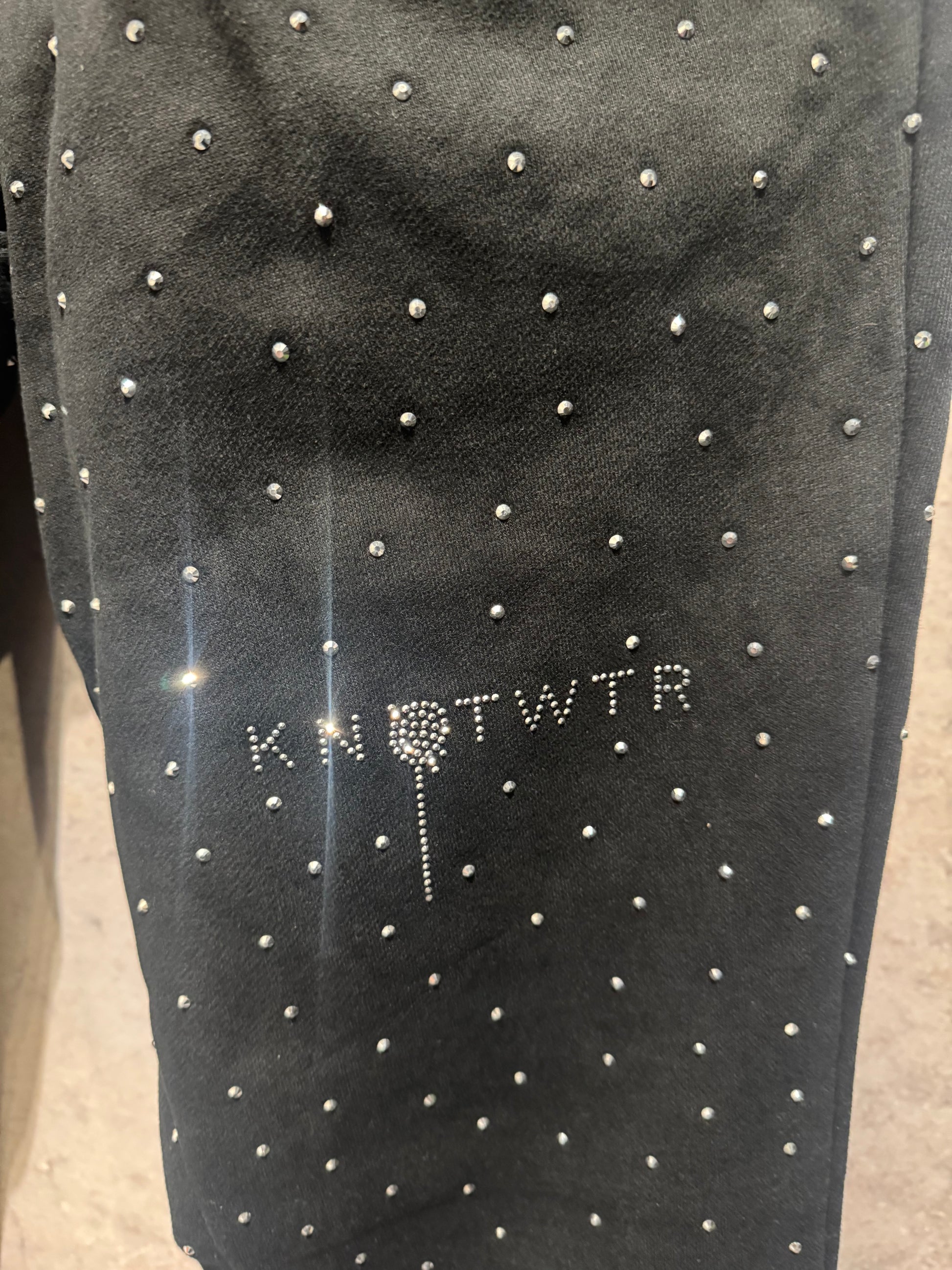 KNOTWTR RHINESTONE FLARED SWEATPANTS: