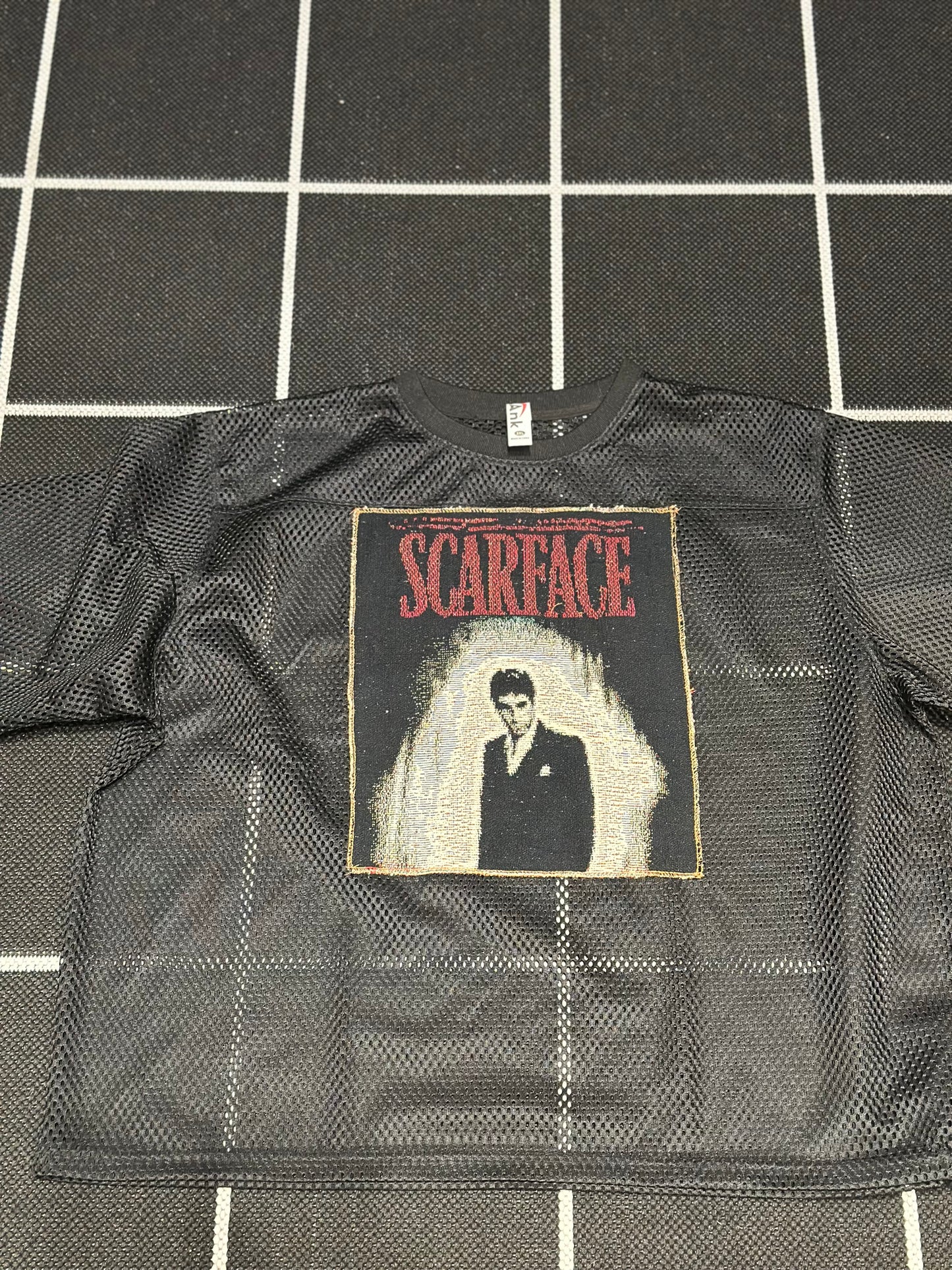 ANGEL GENTLE: JERSEY MESH TAPESTRY TOP- BLACK