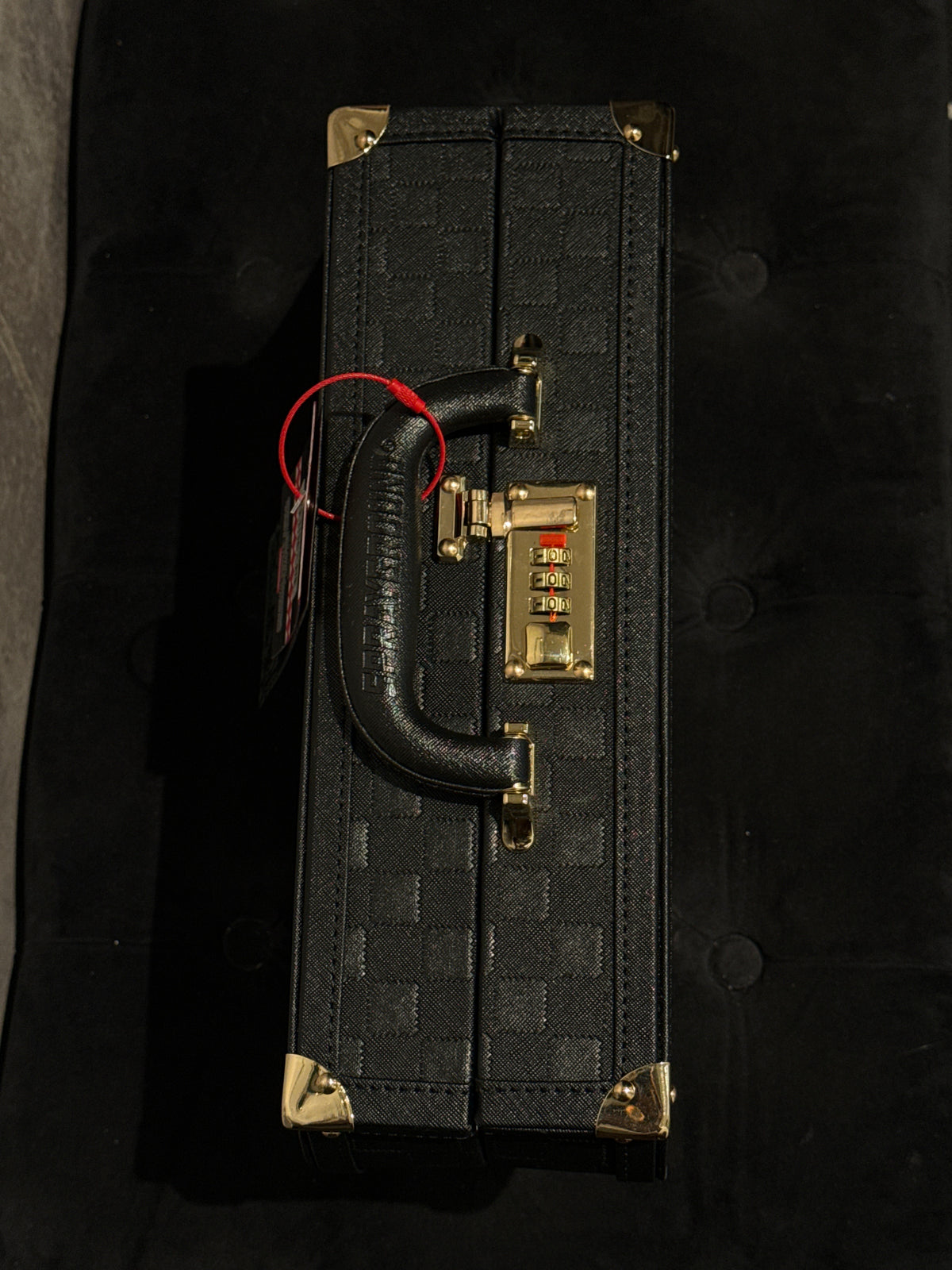 SPRAYGROUND: RAISED CHECK BRIEFCASE