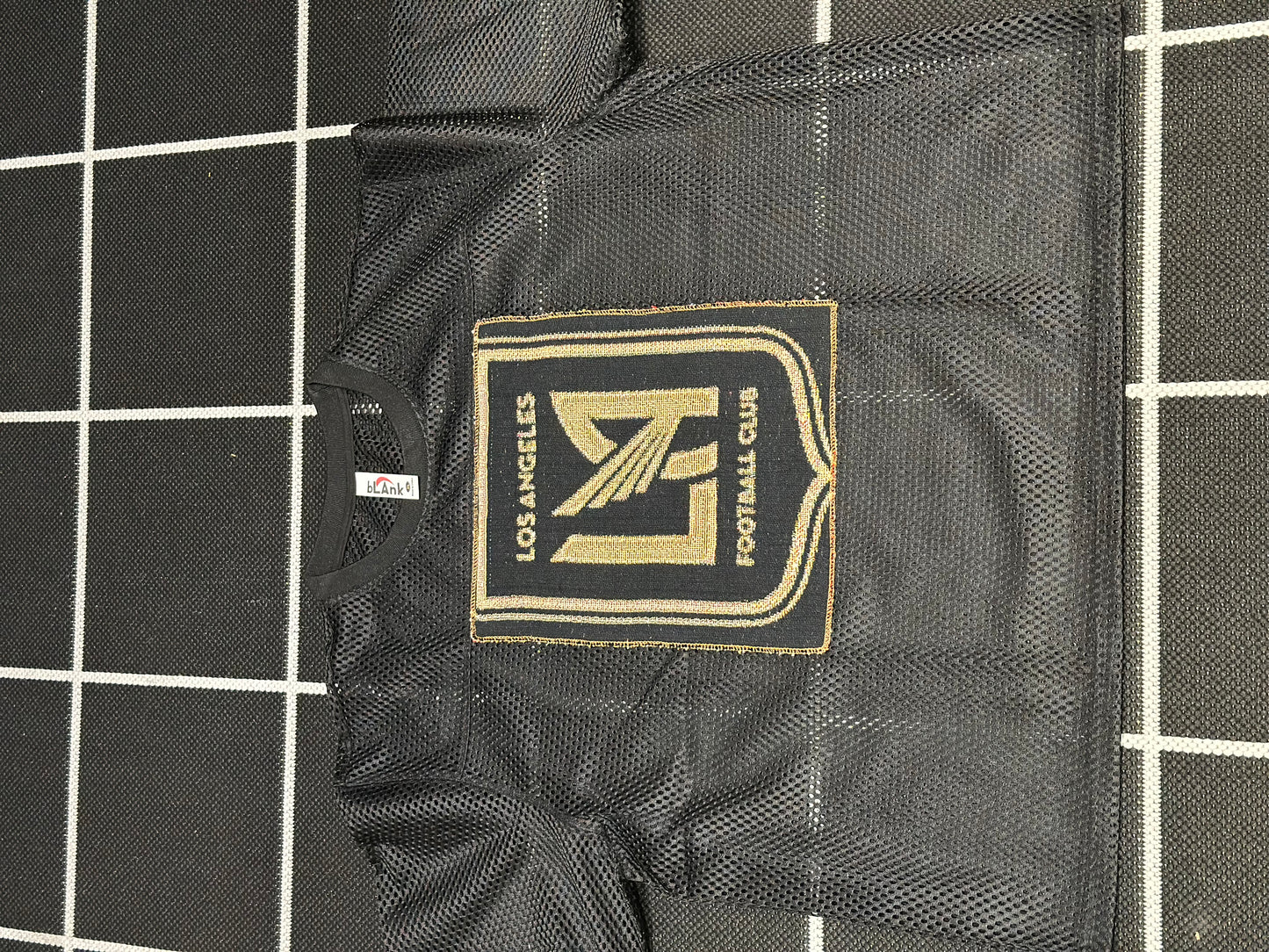 ANGEL GENTLE: JERSEY MESH TAPESTRY TOP- BLACK