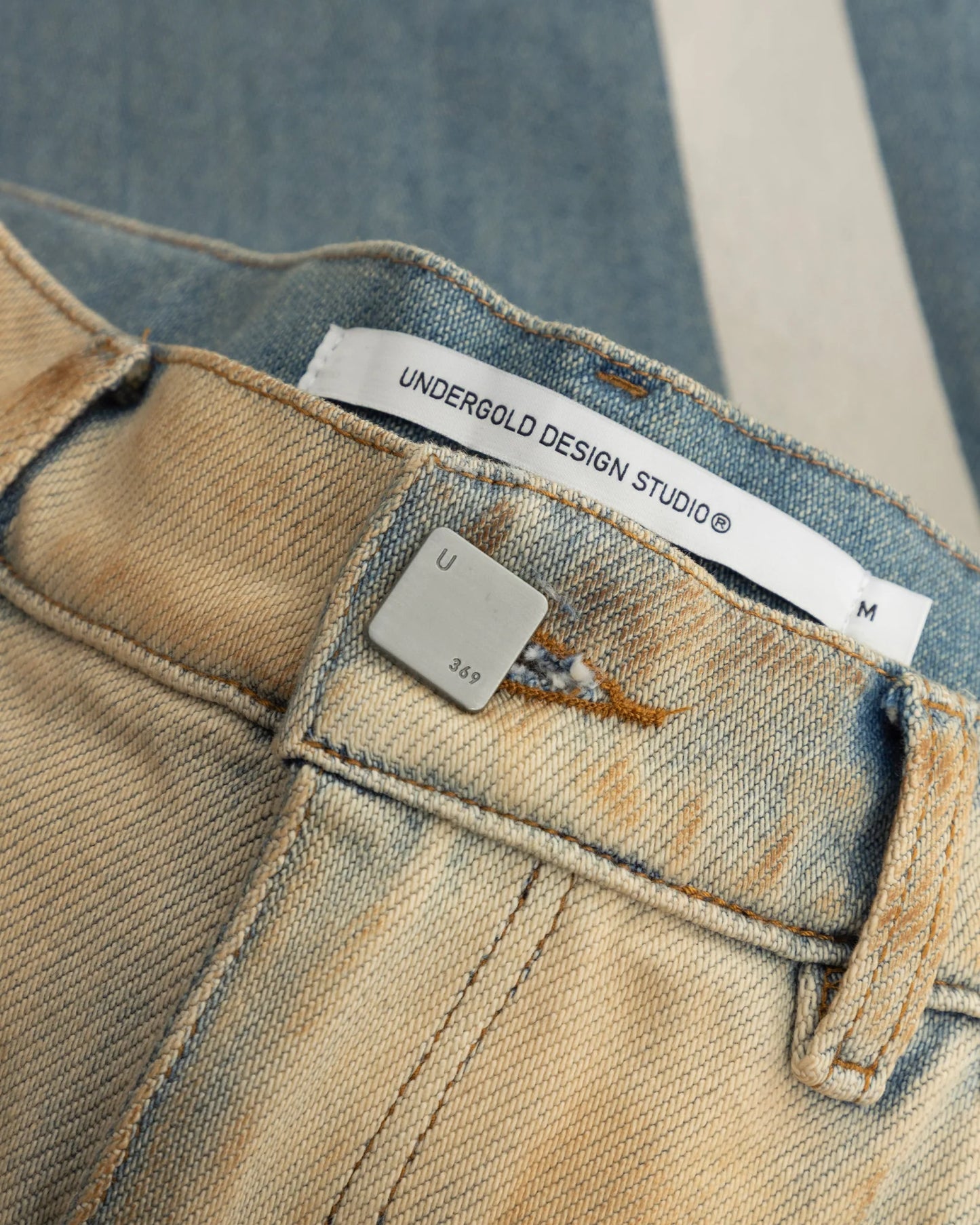 UNDERGOLD: HOLY STATE JEANS