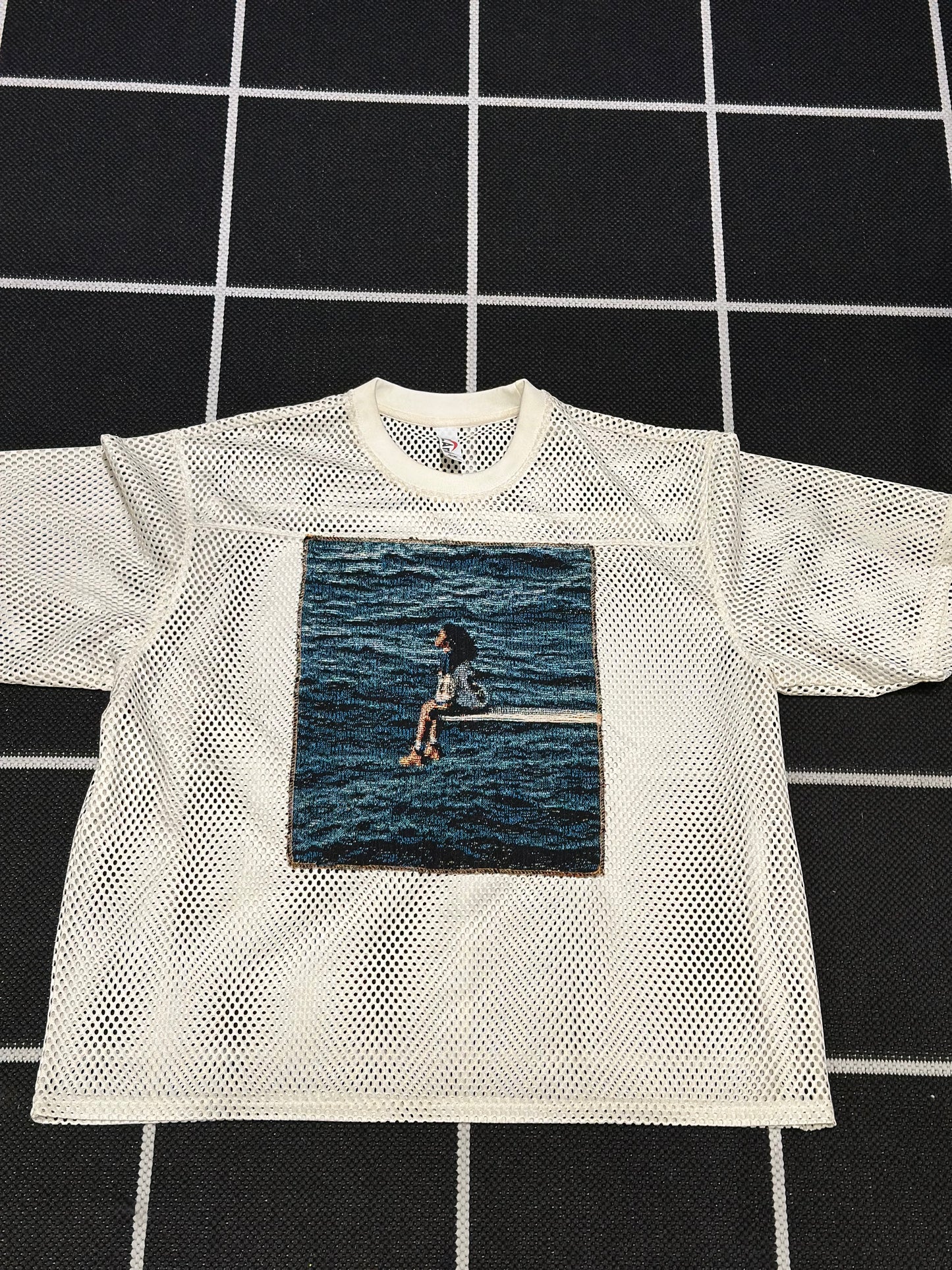 ANGEL GENTLE: SZA JERSEY MESH TAPESTRY TOP