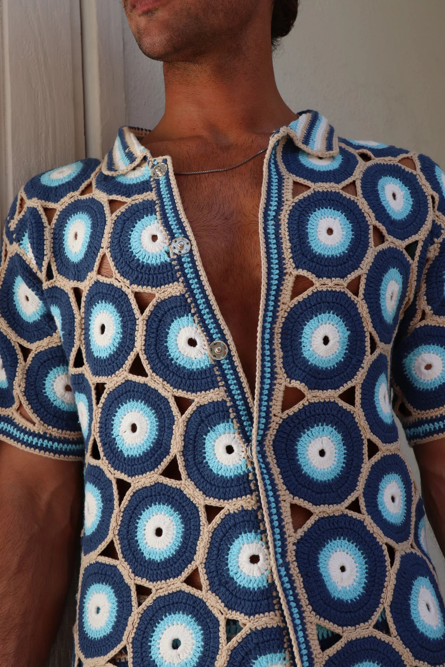 MARVANS: EVIL EYE KNIT SHIRT close up view on model 