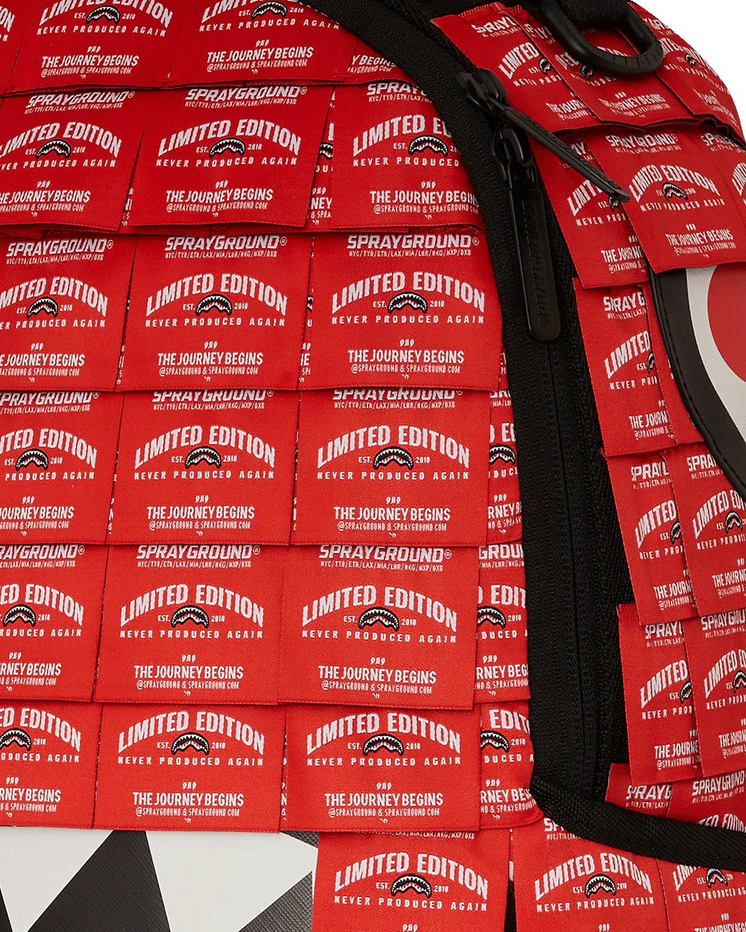 SPRAYGROUND: MADE OF WOVEN LABELS SHARK BACKPACK