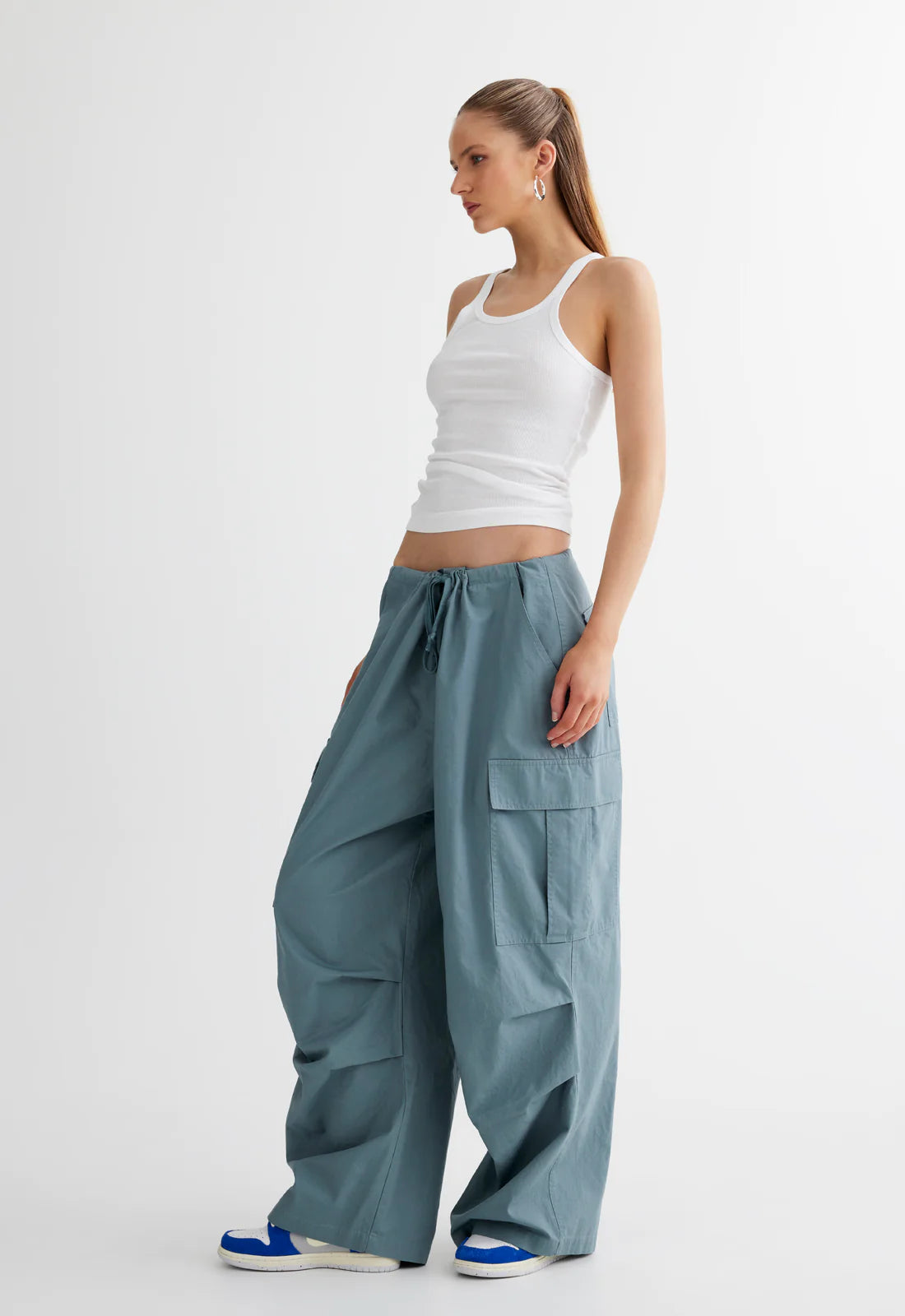 LIONESS: slate Utility Pants (side view on model)
