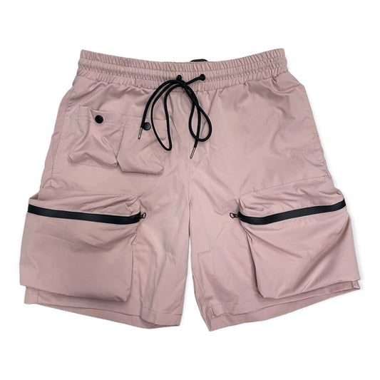 EPTM: COMBAT SHORTS (front view) The perfect pair of nylon shorts for the summer. The Combat Shorts are cut and designed with comfort and function in mind. 3D pockets and matte black hardware give these shorts an elevated look. 

Comes in Dusty Pink & Mustard
