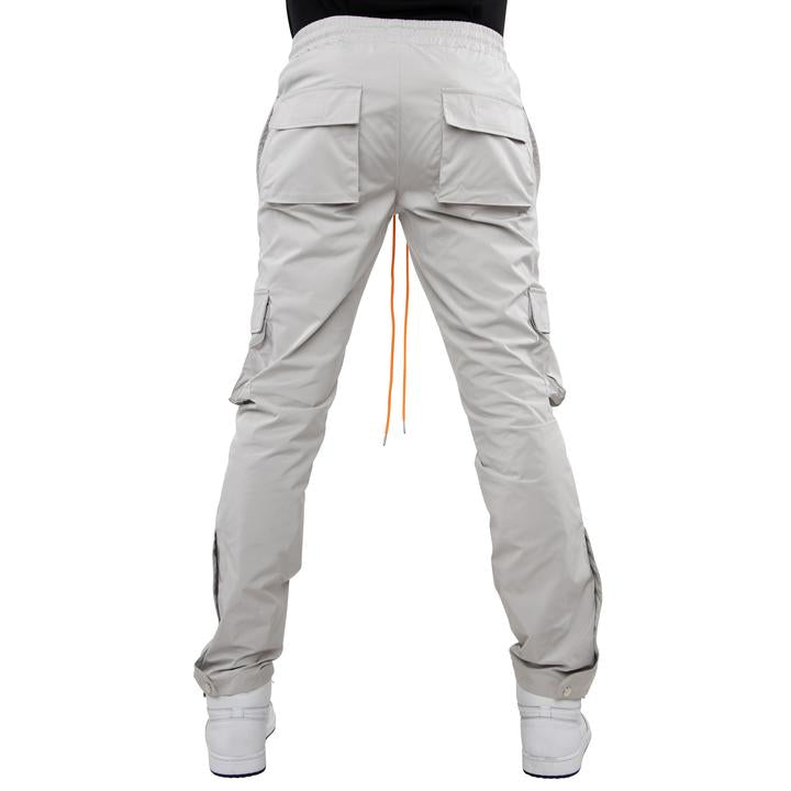 EPTM SNAP GARGO PANTS (grey with orange strings- back view)
Self: 100% Polyester
relaxed fit
reflective logo at the cargo pocket
adjustable toggle at the bottom