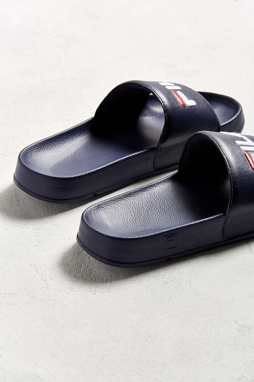 FILA HERITAGE: DRIFTER NAVY SLIDE SANDALS - 85 86 eightyfiveightysix