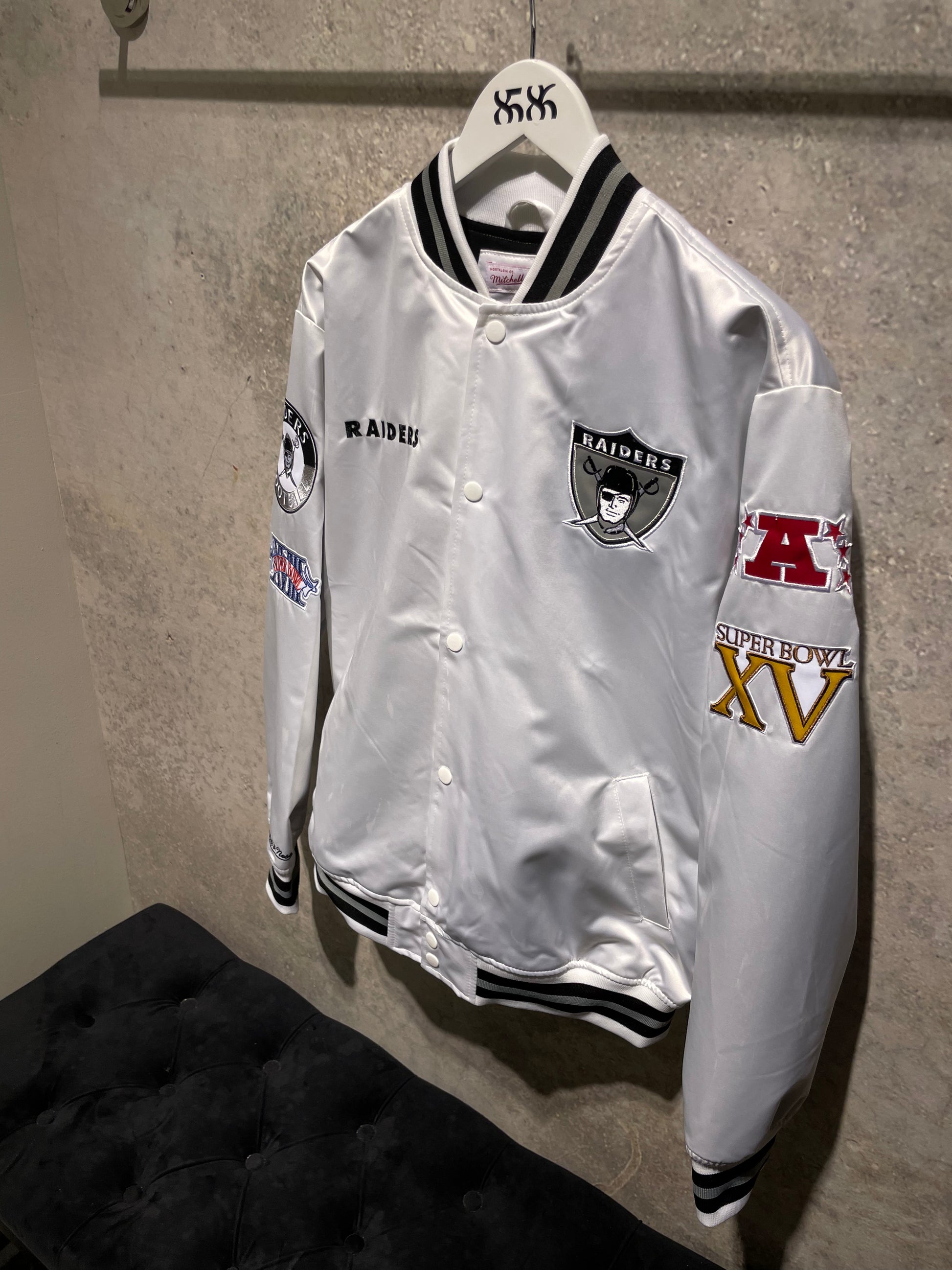 Mitchell and ness clearance raiders jacket